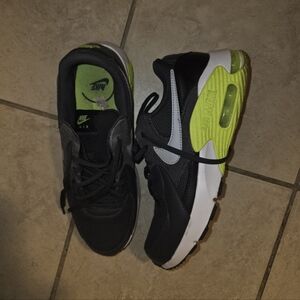 Women's Nike Air Max Excee sneakers in a black, grey, and neon yellow